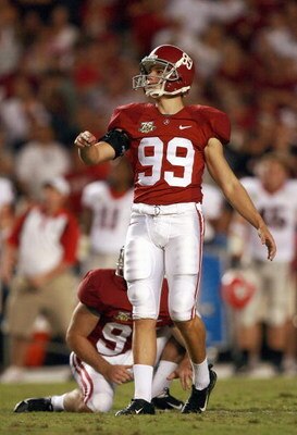 TUSCALOOSA, AL - SEPTEMBER 22: Leigh Tiffin #99 of the Alabama Crimson Tide follows his field goal kick against the Georgia Bulldogs at Bryant-Denny Stadium September 22, 2007 in Tuscaloosa, Alabama. Georgia defeated Alabama 26-23 in overtime. (Photo by D