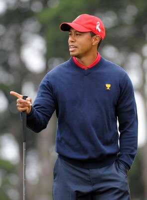SAN FRANCISCO - OCTOBER 11:  Tiger Woods of the USA Team reacts to his putt on the fourth hole during the Day Four Singles Matches of The Presidents Cup at Harding Park Golf Course on October 11, 2009 in San Francisco, California.  (Photo by Harry How/Get