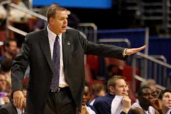 PHILADELPHIA - MARCH 19:  Dave Rose, head coach of the Brigham Young Cougars, communicates with the team during the first round of the NCAA Division I Men's Basketball Tournament against the Texas A&M Aggies at the Wachovia Center on March 19, 2009 in Phi