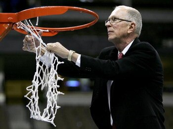 DENVER - MARCH 11:  Head coach Steve Fisher of the San Diego State University Aztecs cuts down the net after defeating the Wyoming Cowboys 69-64 in the championship of the Mountain West Conference Basketball Tournament on March 11, 2006 at the Pepsi Cente