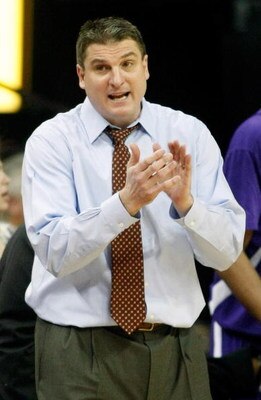 LAS VEGAS - MARCH 12:  Head coach Jim Christian of the Texas Christian University Horned Frogs applauds during a game against the Utah Utes during a quarterfinal game of the Conoco Mountain West Conference Basketball Championships at the Thomas & Mack Cen