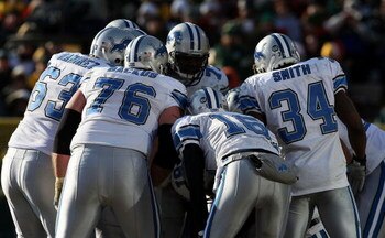GREEN BAY, WI - DECEMBER 28: Members of the Detroit Lions huddle on offense during a game against the Green Bay Packers on December 28, 2008 at Lambeau Field in Green Bay, Wisconsin. The Packers defeated the Lions 31-21. (Photo by Jonathan Daniel/Getty Im
