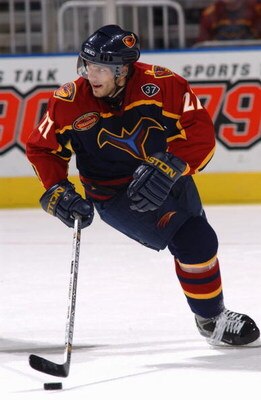 ATLANTA - OCTOBER 18:  Center Patrik Stefan #27 of the Atlanta Thrashers controls the puck during the game against the Chicago Blackhawks at Philips Arena on October 18, 2003 in Atlanta, Georgia.  The Thrashers defeated the Blackhawks 7-2.  (Photo by Scot