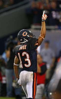 CHICAGO - SEPTEMBER 20: Johnny Knox #13 of the Chicago Bears celebrates a touchdown catch against the Pittsburgh Steelers on September 20, 2009 at Soldier Field in Chicago, Illinois. The Bears defeated the Steelers 17-14. (Photo by Jonathan Daniel/Getty I