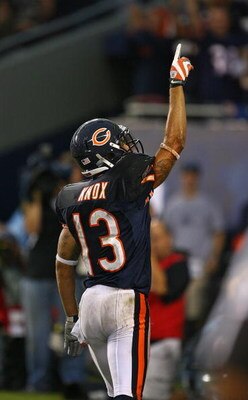 CHICAGO - SEPTEMBER 20: Johnny Knox #13 of the Chicago Bears celebrates a touchdown catch against the Pittsburgh Steelers on September 20, 2009 at Soldier Field in Chicago, Illinois. The Bears defeated the Steelers 17-14. (Photo by Jonathan Daniel/Getty I