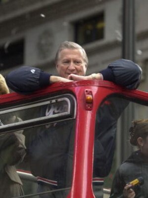 30 Oct 2000:  New York Yankee owner George Steinbrenner rides a double decker bus during their victory parade up the Canyon of Heroes in New York City. Digital File Mandatory Credit: Ezra Shaw/Getty Images