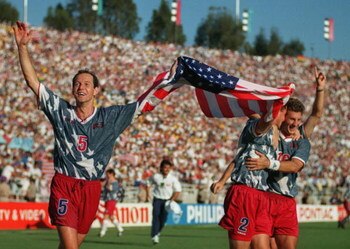 22 JUN 1994:  THOMAS DOOLEY OF USA CELEBRATES WITH HIS TEAM MATES ON A LAP OF HONOUR AFTER THEIR 2-1 VICTORY OVER COLOMBIA . GAME FIFTEEN IN THE FIRST STAGE OF THE 1994 WORLD CUP FINALS. USA WON THE MATCH 2-1 Mandatory Credit: Shaun Botterill/ALLSPORT
