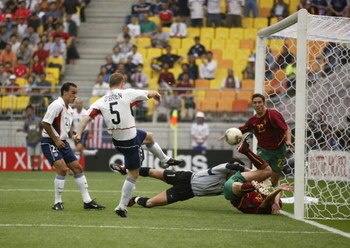 SUWON - JUNE 5:  John O'Brien of the USA scores the opening goal during the first half of the Portugal v USA, Group D, World Cup Group Stage match played at the Suwon World Cup Stadium, Suwon, South Korea on June 5, 2002. USA won the match 3 - 2. (Photo b