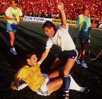 OCT 1989:  TONY MEOLA (ON FLOOR) AND JOHN HARKES OF THE US NATIONAL SOCCER CELEBRATE AFTER DEFEATING TRINIDAD AND TOBAGO 1-0 TO QUALIFY FOR THE 1990 WORLD CUP FINALS. Mandatory Credit: RUSSELL CHEYNE/ALLSPORT