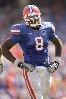 GAINESVILLE, FL - SEPTEMBER 27:  Carlos Dunlap #8 of the Florida Gators stands on the field during the game against the Mississippi Rebels at Ben Hill Griffin Stadium on September 27, 2008 in Gainesville, Florida.  (Photo by Sam Greenwood/Getty Images)