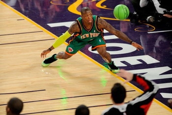 PHOENIX - FEBRUARY 14:  Nate Robinson of the New York Knicks comes down after dunking in the finals of the Sprite Slam Dunk Contest on All-Star Saturday Night, part of 2009 NBA All-Star Weekend at US Airways Center on February 14, 2009 in Phoenix, Arizona