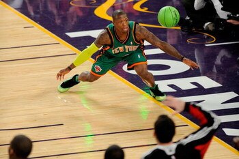 PHOENIX - FEBRUARY 14:  Nate Robinson of the New York Knicks comes down after dunking in the finals of the Sprite Slam Dunk Contest on All-Star Saturday Night, part of 2009 NBA All-Star Weekend at US Airways Center on February 14, 2009 in Phoenix, Arizona