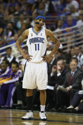 ORLANDO, FL - JUNE 14: Courtney Lee #11 of the Orlando Magic stands on the court during Game Five of the 2009 NBA Finals against the Los Angeles Lakers on June 14, 2009 at Amway Arena in Orlando, Florida. The Lakers won 99-86. NOTE TO USER: User express