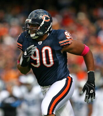 CHICAGO - OCTOBER 04: Jarron Gilbert #90 of the Chicago Bears chases a Detroit Lion runner on October 4, 2009 at Soldier Field in Chicago, Illinois. The Bears defeated the Lions 48-24. (Photo by Jonathan Daniel/Getty Images)