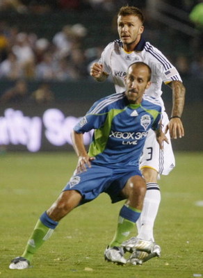 CARSON, CA - AUGUST 15:  Peter Vagenas #8 of the Seattle Sounders FC battles against David Beckham #23 of the Los Angeles Galaxy during the game at The Home Depot Center on August 15, 2009 in Carson, California. (Photo by Jeff Gross/Getty Images)