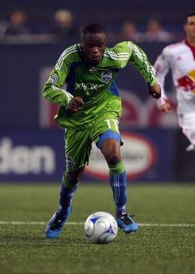 EAST RUTHERFORD, NJ - JUNE 20:  Steve Zakuani #11 of the Seattle Sounders FC plays the ball against the New York Red Bulls at Giants Stadium in the Meadowlands on June 20, 2009 in East Rutherford, New Jersey.  (Photo by Mike Stobe/Getty Images for New Yor