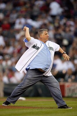 SEATTLE - SEPTEMBER 18:  Head coach Sigi Schmid of the Seattle Sounders throws out the first pitch prior to the game between the Seattle Mariners and the New York Yankees on September 18, 2009 at Safeco Field in Seattle, Washington. (Photo by Otto Greule 