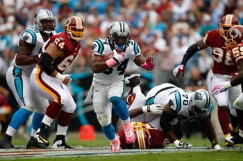 CHARLOTTE, NC - OCTOBER 11:  DeAngelo Williams #34 of the Carolina Panthers runs with the ball against the Washington Redskins at Bank of America Stadium on October 11, 2009 in Charlotte, North Carolina.  (Photo by Streeter Lecka/Getty Images)