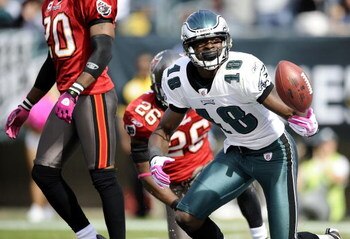 PHILADELPHIA - OCTOBER 11:  Jeremy Maclin #18 of the Philadelphia Eagles celebrates his touchdown in front of Will Allen #26 of the Tampa Bay Buccaneers at Lincoln Financial Field on October 11, 2009 in Philadelphia, Pennsylvania.  (Photo by Jeff Zelevans