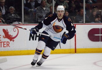 ANAHEIM, CA - FEBRUARY 15:  Zach Bogosian #4 of the Atlanta Thrashers skates in the defensive zone during the NHL game against the Anaheim Ducks at Honda Center on February 15, 2009 in Anaheim, California. The Thrashers defeated the Ducks 8-4.  (Photo by 