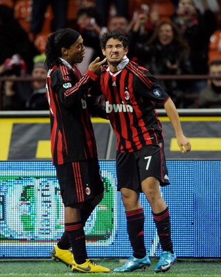 MILAN, ITALY - OCTOBER 18:  Alexandre Pato and Ronaldinho of AC Milan celebrate after Milan's second goal during the Serie A match between AC Milan and AS Roma at Stadio Giuseppe Meazza on October 18, 2009 in Milan, Italy.  (Photo by Claudio Villa/Getty I