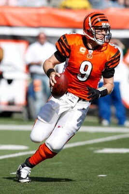 CINCINNATI, OH - OCTOBER 18: Quarterback Carson Palmer #9 of the Cincinnati Bengals runs with the football against the Houston Texans at Paul Brown Stadium on October 18, 2009 in Cincinnati, Ohio. The Texans defeated the Bengals 28-17. (Photo by Scott Boe