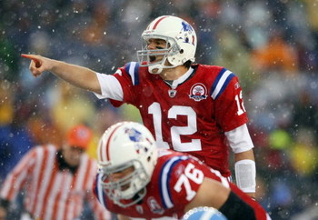 FOXBORO, MA - OCTOBER 18: Quarterback Tom Brady #12 of the New England Patriots calls out the play as Sebastian Vollmer #76 listens in the first quarter against the Tennessee Titans on October 18, 2009 at Gillette Stadium in Foxboro, Massachusetts. (Pho