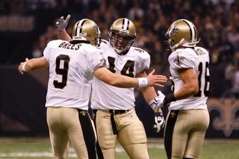 NEW ORLEANS - OCTOBER 18:  Drew Brees #9, Heath Evans #44 and Lance Moore #16 of the New Orleans Saints celebrate after scoring a touchdown against the New York Giants at the Louisiana Superdome on October 18, 2009 in New Orleans, Louisiana.  (Photo by Ch