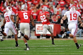COLUMBUS, OH - OCTOBER 10:  Ray Small #82 of the Ohio State Buckeyes returns a kickoff 96-yards for a touchdown in the second half against the Wisconsin Badgers at Ohio Stadium on October 10, 2009 in Columbus, Ohio. Ohio State defeated Wisconsin 31-13.  (