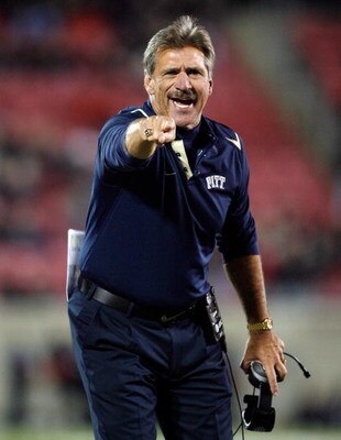 LOUISVILLE, KY - OCTOBER 02:  Dave Wannstedt the Head Coach of the Pittsburgh Panthers coaches from sideline during the Big East Conference game against the Louisville Cardinals at Papa John's Cardinal Stadium on October 2, 2009 in Louisville, Kentucky.  