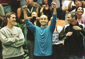 9 Apr 2000: Andre Agassi of the U.S. clowns around with Alex O''Brien (L) and Brad Gilbert (R) during Pete Sampras vs Slava Dosedel of the Czech Republic straight sets win 6-4, 6-4, 6-6 (6-2) in the quarterfinal matches of the Davis Cup at the Great Weste
