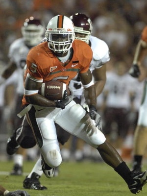 MIAMI, FL - SEPTEMBER 20: Running back Javarris James #5 of  the University of Miami Hurricanes rushes upfield against the Texas A&M Aggies at the Orange Bowl on September 20, 2007 in Miami, Florida.  Miami won 31-17.  (Photo by Al Messerschmidt/Getty Ima