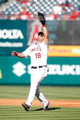 ANAHEIM, CA - OCTOBER 01:  Kendry Morales #19 of the Los Angeles Angels of Anaheim looks to catch a fly ball against the Texas Rangers at Angel Stadium on October 1, 2009 in Anaheim, California. The Rangers defeated the Angels 11-3.  (Photo by Jeff Gross/
