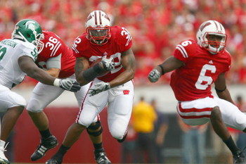 MADISON, WI - SEPTEMBER 26: John Clay #32 of the Wisconsin Badgers carries the ball against the Michigan State Spartans on September 26, 2009 at Camp Randall Stadium in Madison, Wisconsin. (Photo by Jonathan Daniel/Getty Images)
