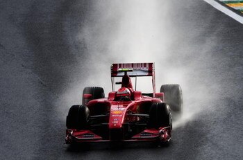 SAO PAULO, BRAZIL - OCTOBER 17:  Kimi Raikkonen of Finland and Ferrari drives during qualifying for the Brazilian Formula One Grand Prix at the Interlagos Circuit on October 17, 2009 in Sao Paulo, Brazil.  (Photo by Clive Mason/Getty Images)