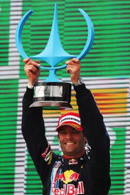 SAO PAULO, BRAZIL - OCTOBER 18:  Mark Webber of Australia and Red Bull Racing celebrates on the podium after winning the Brazilian Formula One Grand Prix at the Interlagos Circuit on October 18, 2009 in Sao Paulo, Brazil.  (Photo by Getty Images)