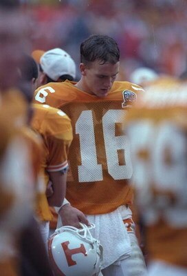 21 Sep 1996: Quarterback Peyton Manning #16 of the Tennessee Volunteers visibly reacts on the sideline to the Volunteers 35-29 loss to the Florida Gators at Neyland Stadium in Knoxville, Tennessee.  Mandatory Credit: Jonathan Daniel  /Allsport