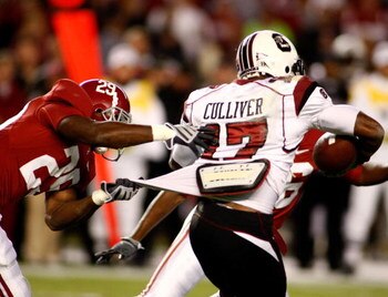 TUSCALOOSA - OCTOBER 17:  Return man Chris Culliver #17 of the South Carolina Gamecocks is tackled by special teams defender Terry Grant #29 of the Alabama Crimson Tide at Bryant-Denny Stadium on October 17, 2009 in Tuscaloosa, Alabama. The Crimson Tide b