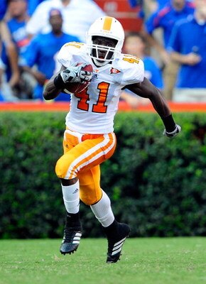 GAINESVILLE, FL - SEPTEMBER 19:  Dennis Rogan #41 of the Tennessee Volunteers runs for yardage during the game against the Florida Gators at Ben Hill Griffin Stadium on September 19, 2009 in Gainesville, Florida.  (Photo by Sam Greenwood/Getty Images)