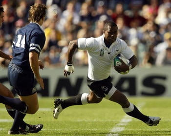 SYDNEY, AUSTRALIA - NOVEMBER 1: Rupeni Caucau of Fiji in action during the Rugby World Cup Pool B match between Scotland and Fiji at Aussie Stadium November 1, 2003 in Sydney, Australia. (Photo by Daniel Berehulak/Getty Images)