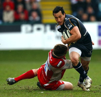 WORCESTER, UNITED KINGDOM - MARCH 22: Rico Gear of Worcester avoids a tackle during the Guinness Premiership game between Worcester Warriors and Gloucester at Sixways Stadium on March 22, 2009 , Worcester, England. (Photo by John Gichigi/Getty Images)