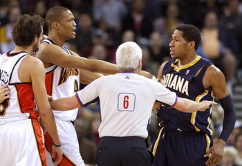 OAKLAND, CA - JANUARY 11: Danny Granger #33 of the Indiana Pacers argues with Marco Belinelli #18 and Anthony Randolph #4 of the Golden State Warriors during an NBA game on January 11, 2009 at Oracle Arena in Oakland, California. Granger and Belinelli wer