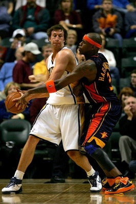 INDIANAPOLIS - JANUARY 16:  Troy Murphy #3 of the Indiana Pacers looks for an outlet pass while being gaurded by Al Harrington #3 of the Golden State Warriors January 16, 2008 at Conseco Fieldhouse in Indianapolis, Indiana.  (Photo by Matthew Stockman/Get