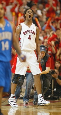 TORONTO, ON - APRIL 26:  Chris Bosh #4 of the Toronto Raptors jubilates after hitting a 3 ball against the Orlando Magic in Game Four of the Eastern Conference Quarterfinals at the Air Canada Centre April 26, 2008 in Toronto, Ontario. The Magic defeated t