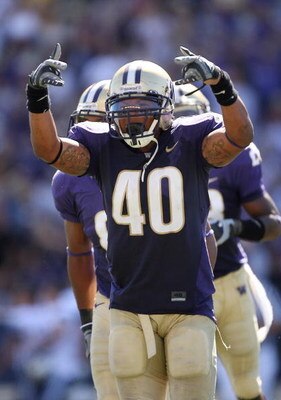 SEATTLE - SEPTEMBER 6:  Mason Foster #40 of the Washington Huskies signals to the sideline during their game against the BYU Cougars on September 6, 2008 at Husky Stadium in Seattle, Washington. The Cougars defeated the Huskies 28-27. (Photo by Otto Greul