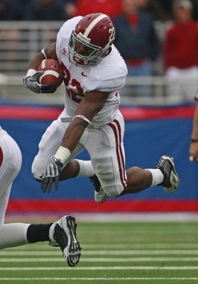 OXFORD, MS - OCTOBER 10: Mark Ingram #22 of the Alabama Crimson Tide runs for a first down in their college football game against the Mississippi Rebels at Vaught-Hemingway Stadium on October 10, 2009 in Oxford, Mississippi. (Photo by Dave Martin/Getty Im