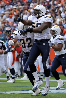 DENVER - OCTOBER 7: Linebacker Brandon Siler #59 of the San Diego Chargers celebrates his 23 yard fumble recovery touchdown against the Denver Broncos during the first quarter of the game at Invesco Field at Mile High October 7, 2007 in Denver, Colorado.