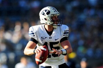 SAN DIEGO - OCTOBER 17: Max Hall #15 of BYU Cougars looks to pass the ball to teamate while playing against San Diego State Aztecs at Qualcomm Stadium on October 17, 2009 in San Diego, California.  (Photo by Jacob de Golish/Getty Images)