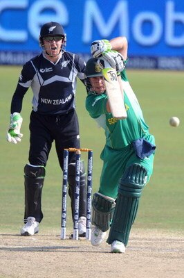 CENTURION, SOUTH AFRICA - SEPTEMBER 24: Brendon McCullum of New Zealand looks on as AB de Villiers of South Africa drives during the ICC Champions Trophy match between South Africa and New Zealand from SuperSport Park on September 24, 2009 in Centurion, S