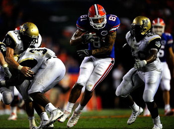 GAINESVILLE, FL - SEPTEMBER 05: Aaron Hernandez #81 of the Florida Gators runs for yardage during the game against the Charleston Southern Buccaneers at Ben Hill Griffin Stadium on September 5, 2009 in Gainesville, Florida. (Photo by Sam Greenwood/Getty